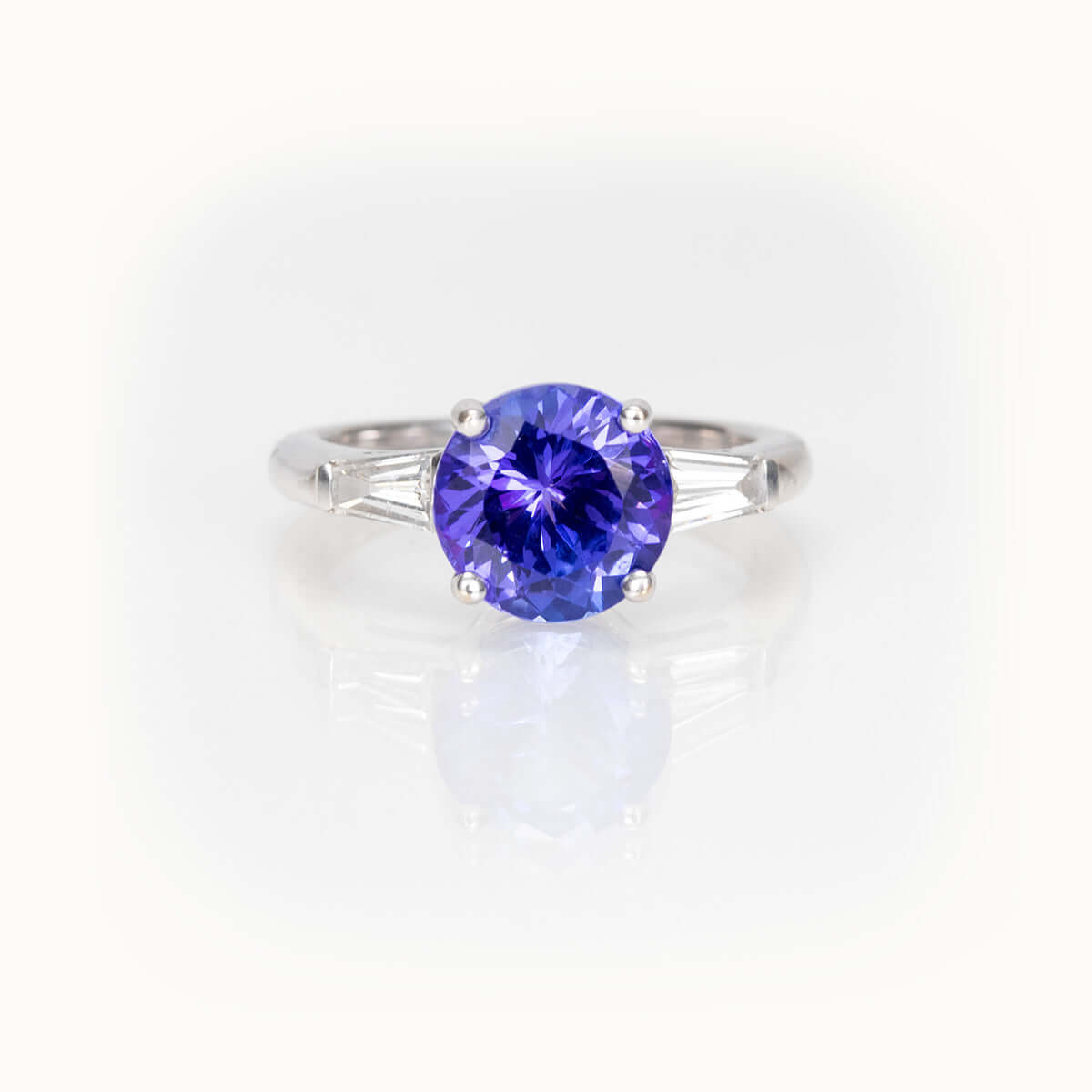 Tanzanite Elegance Ring featuring a 2.64-carat blue-violet tanzanite in 14K white gold, bespoke custom jewelry.