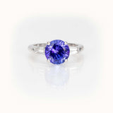 Tanzanite Elegance Ring featuring a 2.64-carat blue-violet tanzanite in 14K white gold, bespoke custom jewelry.