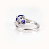 Tanzanite Elegance Ring in 14K white gold showcasing a vibrant 2.64-carat gemstone with tapered baguette side stones.