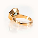 14K yellow gold bespoke octagon-cut Prasiolite ring showcasing minty green gemstone, custom elegant design.
